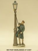 A Lladro lamplighter figure (48cm tall)