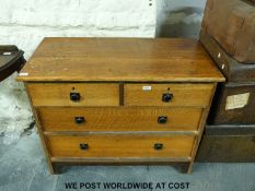 A light oak chest of two over two drawers (H79cm x W100cm x D50cm)