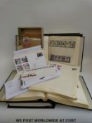 Four albums of GB QEII stamps, new and used, including covers etc,
