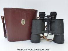 A cased pair of Carl Zeiss Jena Jenoptem 10x50 W binoculars