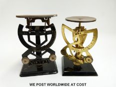 Two bilateral dial type postage scales one with black glass base