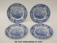 Four late 19thC blue and white dinner plates decorated with harbour scenes