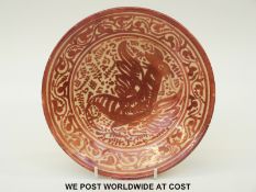 A Spanish copper lustre dish,