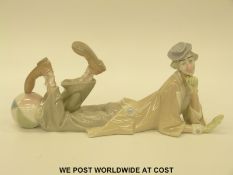 A large Lladro figure of a clown with a ball (37cm tall)