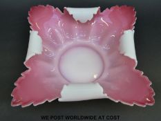 Stourbridge cased glass bowl with white casing over pink interior,