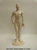 A ceramic acupuncture figure, overall length 46cm,
