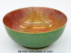 A late 19th / early 20thC high fired pedestal bowl with textured green glaze to the exterior and