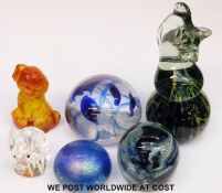 Six various glass paperweights including a Swarovski elephant and a Mdina seahorse.