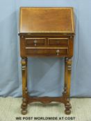 A mahogany continental style bureau with crossbanded detail,
