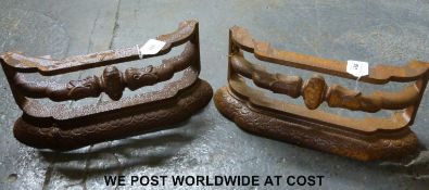 A pair of ornate andirons