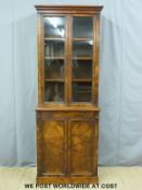A 19thC glazed walnut bookcase with adjustable shelves,