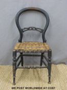 A 19thC child's balloon back chair with wicker seat
