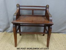 A Victorian mahogany back stool or chair with brass mounts and roundels,