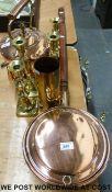A collection of copper and brass ware including warming pan, kettle, shell case,