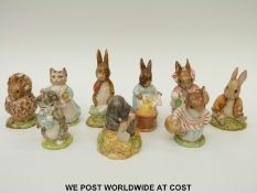 Nine Beswick Beatrix Potter figures including Benjamin Sat on a Bank