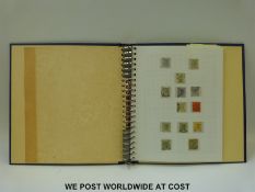 A Commonwealth stamp album of Victoria - George V stamps including good Hong Kong mint and used