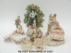 A collection of figures to include Dresden lace,