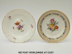 KPM Berlin plate decorated with hand painted flowers and insects together with another Berlin plate