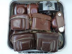 A box of vintage cameras to include Ilford,