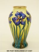 Moorcroft Enamels miniature vase decorated with irises and signed to base Philip Gibson (8cm tall)