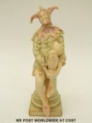 Doulton Vellum ware figure of a jester by Charles Noke,
