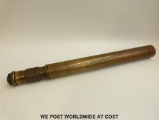 A boxed brass Ross of London military telescope with adjustable magnification from 7 to 21x,