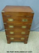 A reproduction military/campaign chest with desk to lid and four drawers below (H85 x W52 x D38cm)