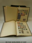 Three albums of all-world stamps including GB