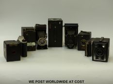 A quantity of vintage cameras to include box and folding examples.