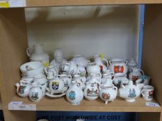 Forty pieces of mixed crested china to include W H Goss; City of Oxford jug, King's Lynn Roman pot,