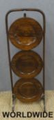 A carved oak mirror, cake stand, wine table,