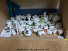 Forty pieces of mixed crested china to include W H Goss & Gemma; Polperro Cornish bussa,