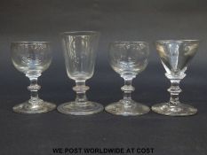 Four Georgian drinking glasses all with knopped stems, one with a folded foot, largest 10cm tall.