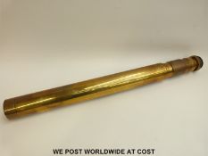 A boxed brass Ross of London military telescope with adjustable magnification from 7 to 21x,