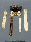 Two 19thC Chinese carved ivory page turners, an ivory paper clip,