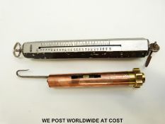 A Lexoguard aluminium Octopus spring balance and a copper and brass screw adjuster
