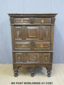 A 17th oak chest on chest of two shallow drawers over three deep drawers raised on turned legs,