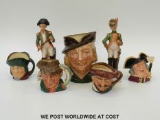 Royal Doulton large character jug Robin Hood, four small jugs and two continental ceramic soldiers.
