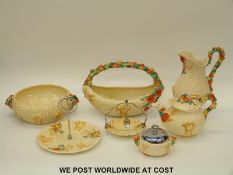 Seven pieces of Clarice Cliff relief moulded Celtic Harvest pattern pottery including teapot,