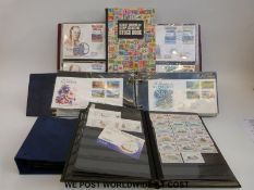 Three albums of St Vincent first day covers and a stockbook of mainly St Vincent QEII stamps