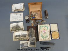 A collection of objets de vertu to include compass, railway badges, fox tie clip, Albert chain,