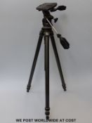 A Gitzo camera tripod marked Reporter Performance