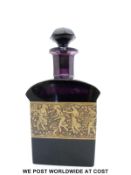 A Moser purple glass scent bottle with bronzed frieze of Amazonian women warriors,