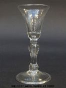 George I gin glass with bell bowl over tear drop inverted baluster stem and cushion knop raised on