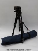 A boxed SLIK compact tripod,