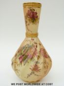 Royal Worcester blush ivory wrythen moulded pedestal vase decorated with flowers,