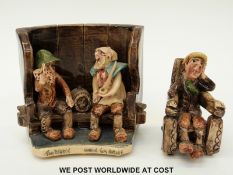 A Will Young pottery group of Tom Pearse being comforted by Uncle Tom Cobley while seated on a