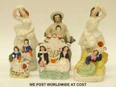 A group of six 19thC and later Staffordshire figures and a spill vase (tallest 32cm)