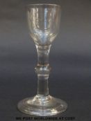 George II drinking glass with ogee bowl over basel ball knopped stem raised on conical foot, c1730,