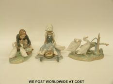 Three Lladro figures all featuring geese and goslings